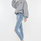 Mid Rise Distressed Ankle Skinny Jeans